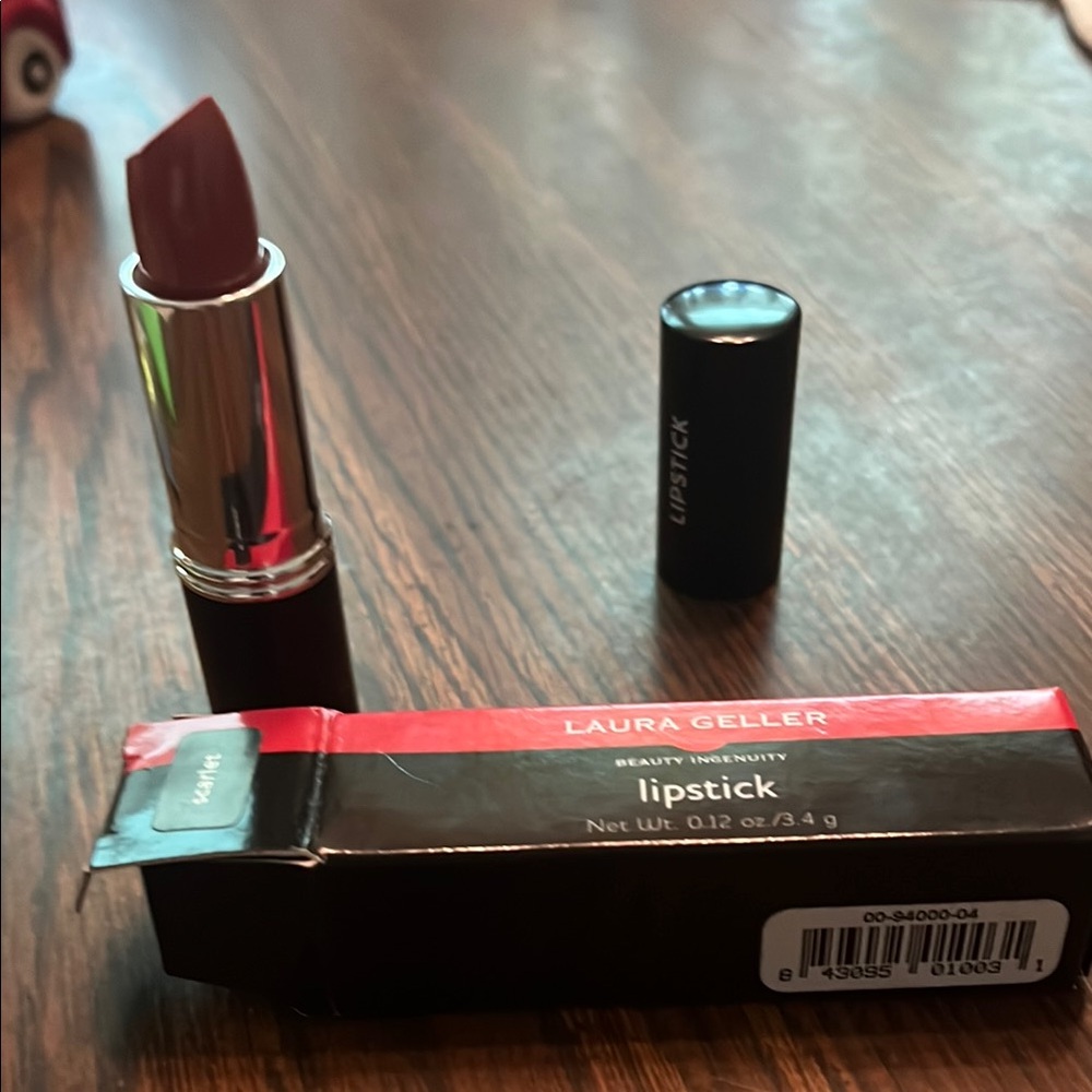 Laura Geller Red Lipstick scarlet is the color brand new